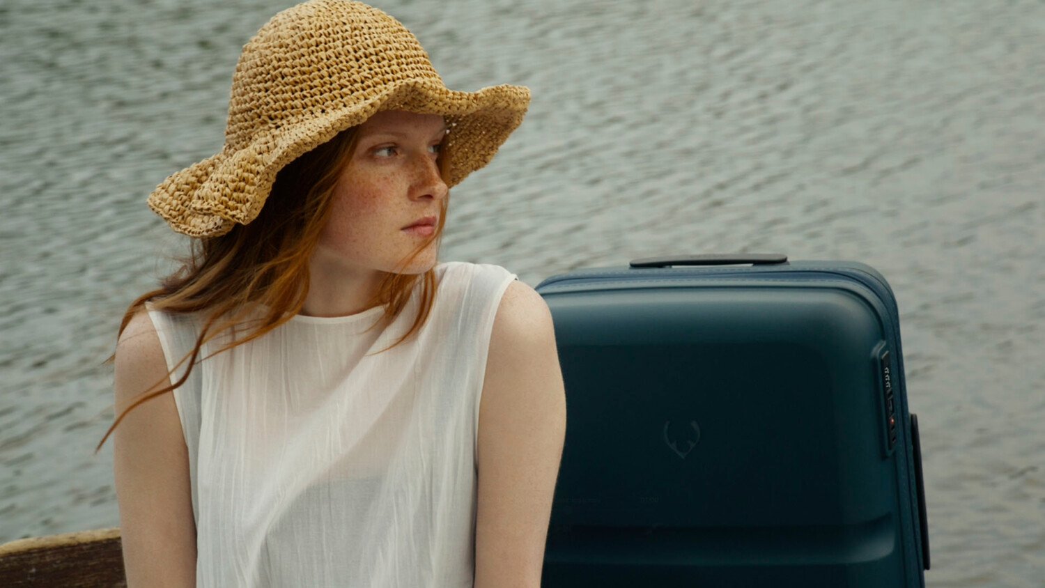 Antler Summer Second Chapter film in nature with model by river, trees, swans and boat