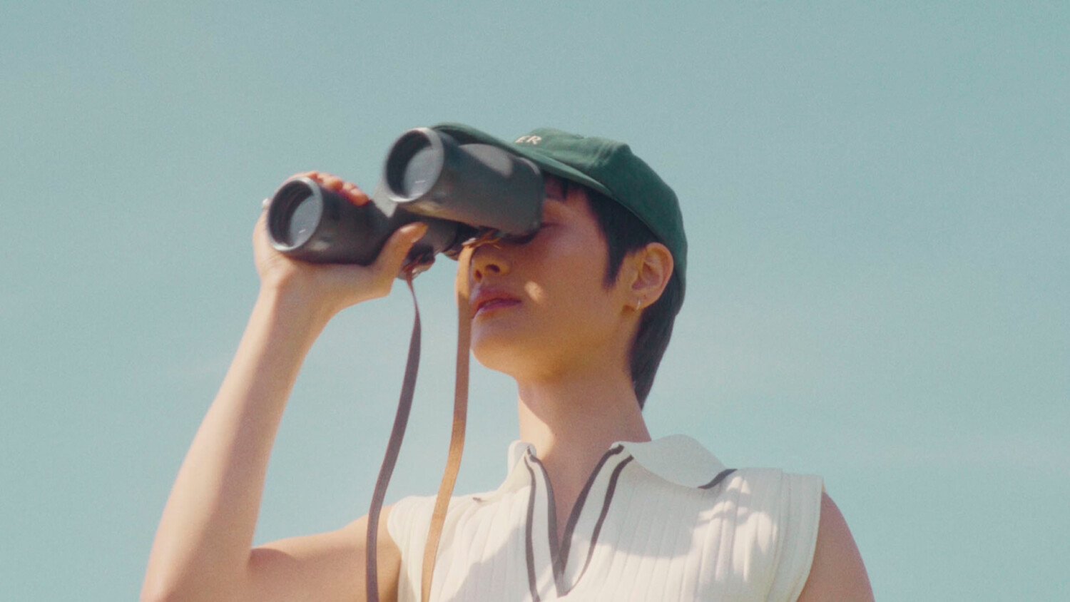 Antler Summer Campaign Film with models playing tennis and relaxing by pool with suitcases and bags