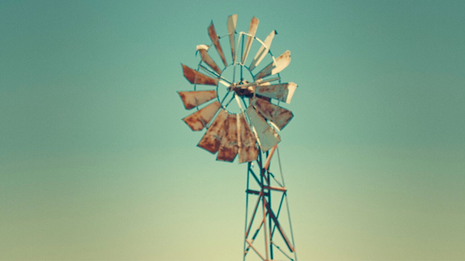 Hush Summer Campaign Film thumbnail showing windmill landscape under sunlight during road trip
